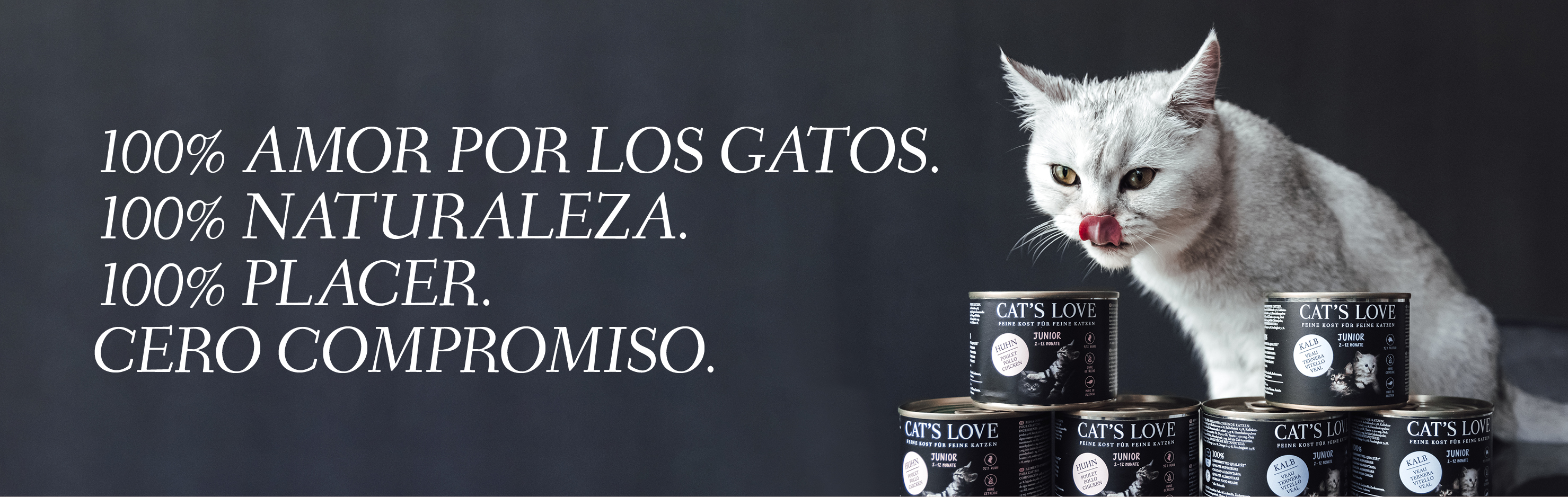 Banner con un gato lamiéndose la boca y productos CAT'S LOVE delante. El texto de la pancarta dice: 100% CAT'S LOVE. 100% NATURALEZA. 10% DISFRUTE. Sin compromisos.