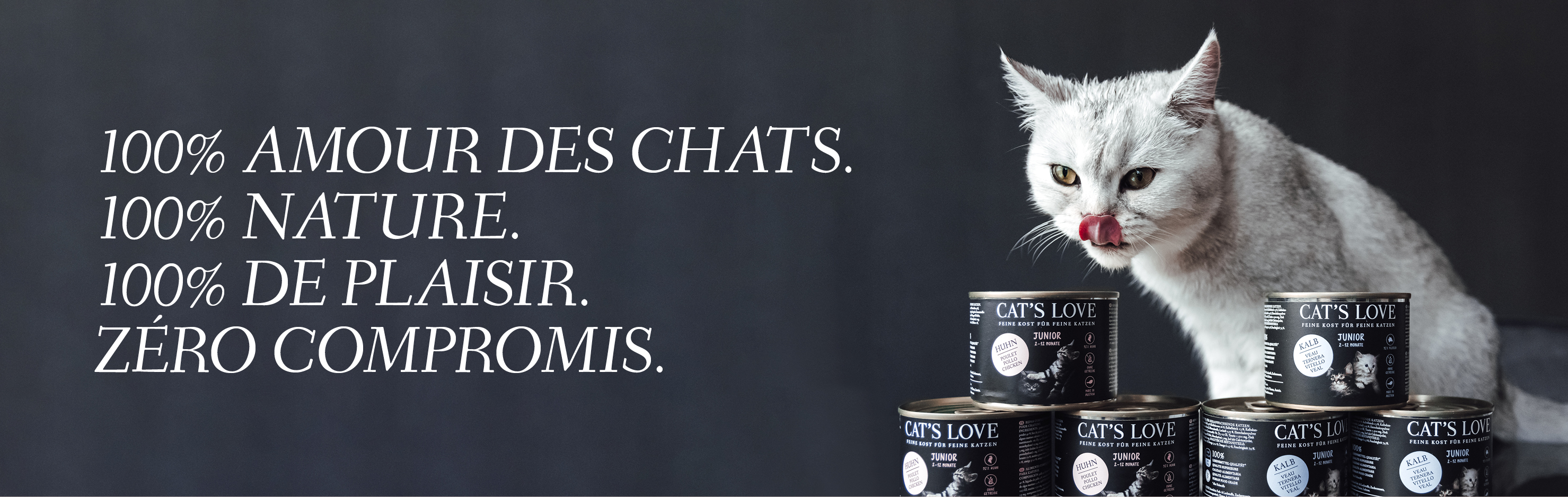 Bannière avec un chat qui se lèche la gueule et sur laquelle des produits CAT'S LOVE sont présentés devant lui. Le texte sur la bannière dit : 100% AMOUR DES CHATS. 100% NATURE. 10% DE PLAISIR. Pas de compromis.
